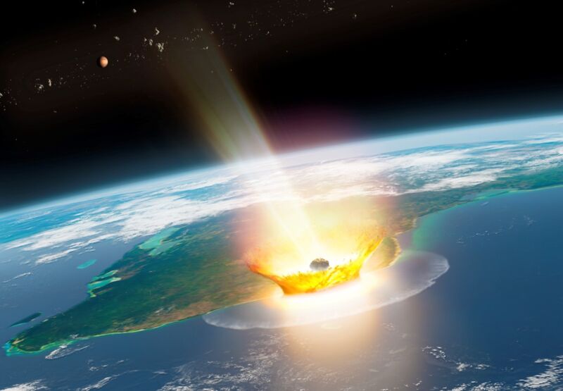 Artist impression of a large asteroid impacting on Earth such as the Chicxulub event that caused the end-Cretaceous mass extinction, 66 million years ago.