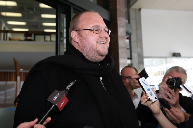 Kim Dotcom speaks to the media following a bail hearing at Auckland District Court on December 1, 2014 in Auckland, New Zealand.